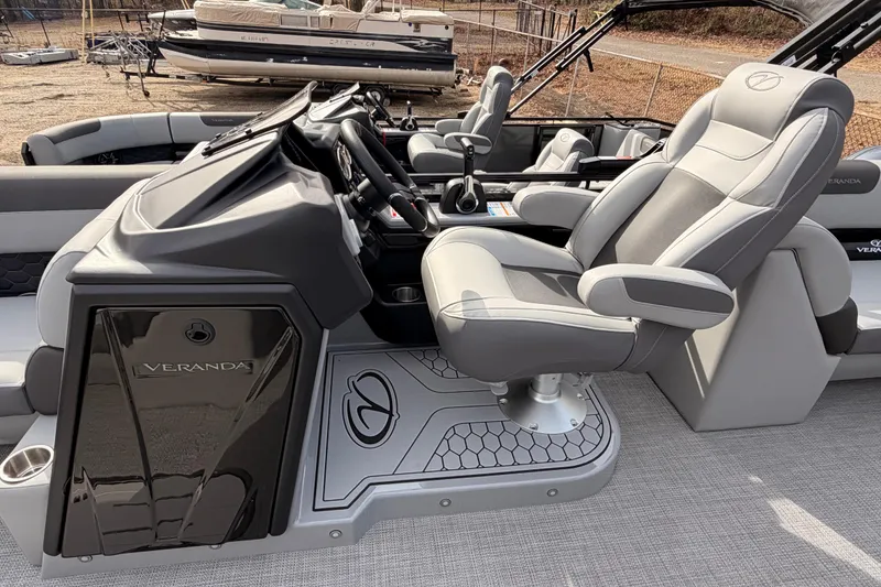 Slide: The Image of Captain's seat and helm of 2026 Veranda VR 235 RC pontoon boat. - 7