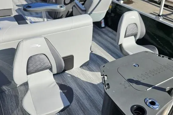 Slide: The Image of 2026 Bennington 22 S Fish boat interior with gray seating and fishing station. - 12
