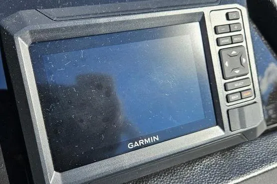 Slide: The Image of Garmin display on 2026 Bennington 22 S Fish boat dashboard. - 16