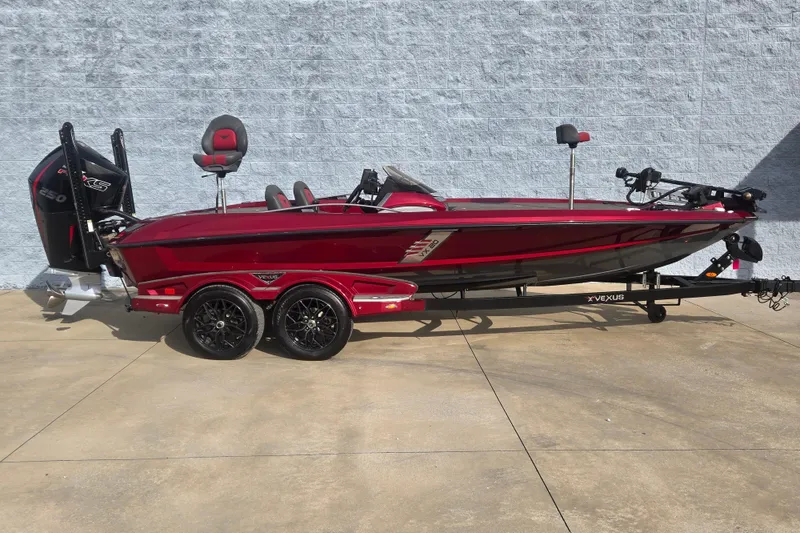 The Image of 2020 Vexus VX20 boat in red, on a trailer, parked outdoors. - 1