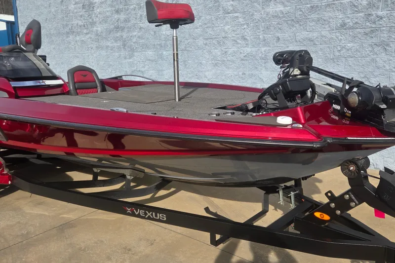 Slide: The Image of 2020 Vexus VX20 boat in red, on a trailer, with fishing equipment. - 4