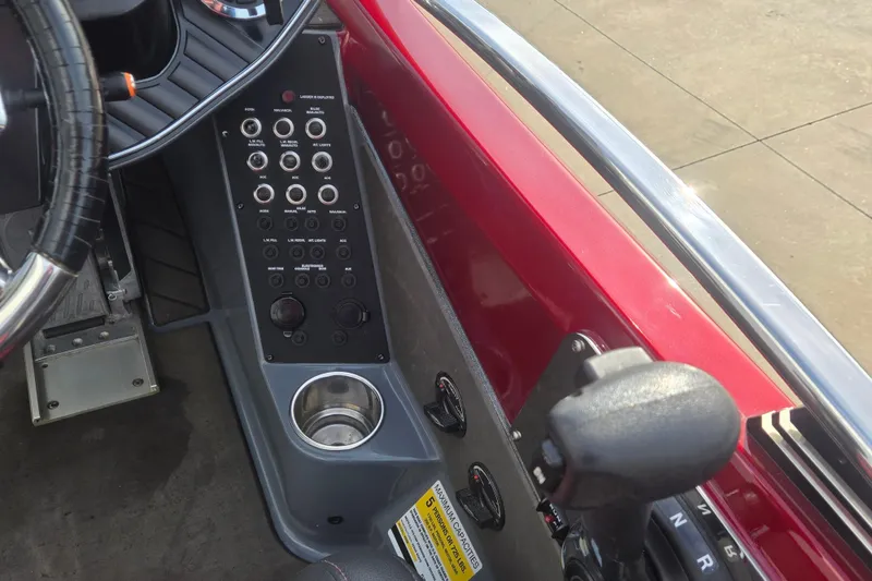 Slide: The Image of 2020 Vexus VX20 boat dashboard with control panel and steering wheel. - 7