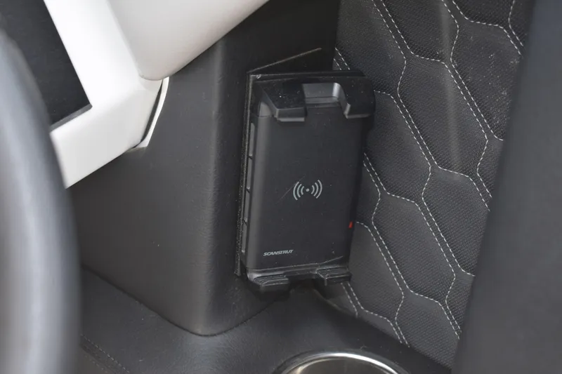 Slide: The Image of Wireless phone charger in 2022 Four Winns H2 OB boat interior. - 20