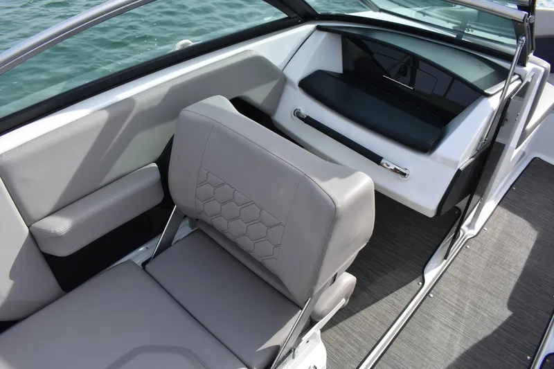Slide: The Image of 2022 Four Winns H2 OB boat interior with gray seating and sleek design. - 29