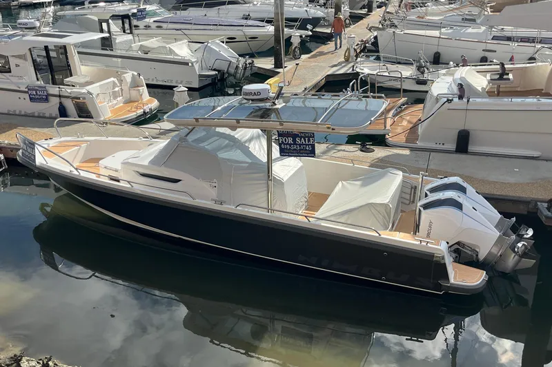 The Image of Nimbus T9 2024 motorboat docked for sale in marina. - 0