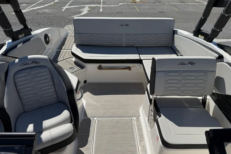 Slide: The Image of 2026 Sea Ray SPX 210 boat interior with stylish seating and modern design. - 14