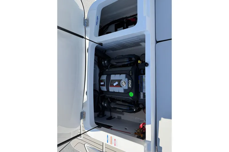 Slide: The Image of Engine compartment of 2026 Sea Ray SPX 210 boat, showcasing a 250 horsepower engine. - 15