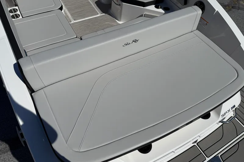 Slide: The Image of 2026 Sea Ray SPX 210 boat with sleek gray seating and modern design. - 4