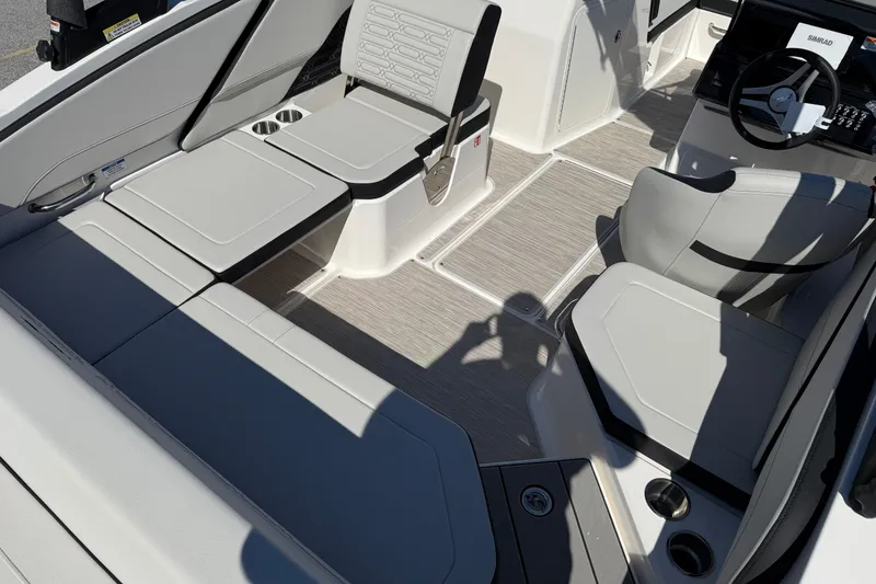 Slide: The Image of 2026 Sea Ray SPX 210 boat interior with sleek seating and modern design. - 6