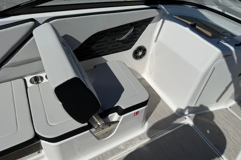 Slide: The Image of 2026 Sea Ray SPX 210 boat interior with sleek seating and modern design features. - 9