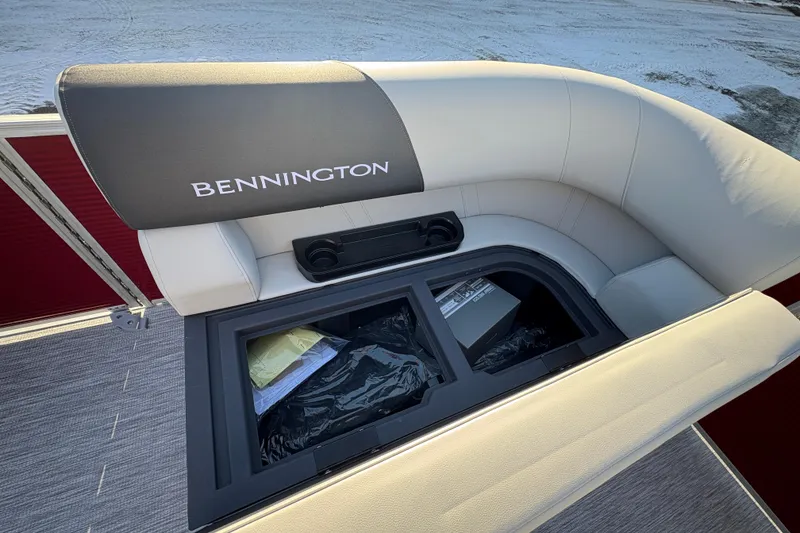 Slide: The Image of 2026 Bennington 20 SL boat seat with storage compartment and cup holders. - 10