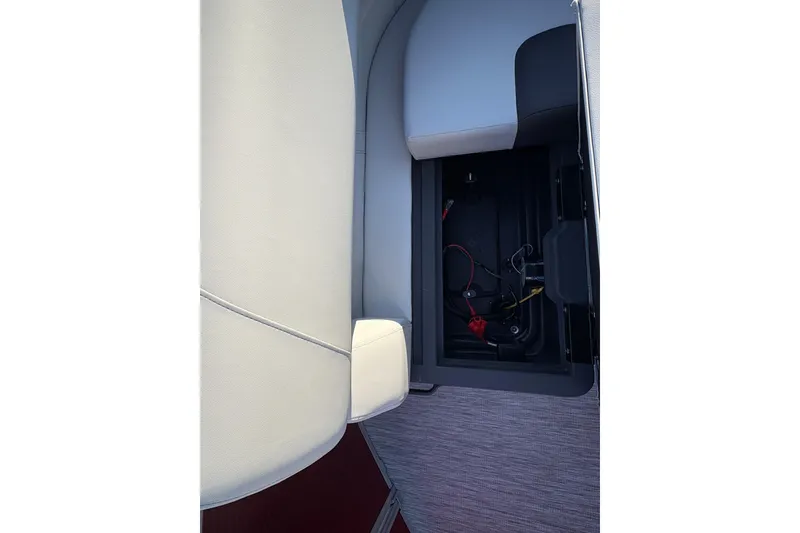 Slide: The Image of 2026 Bennington 20 SL boat interior storage compartment with wiring. - 18