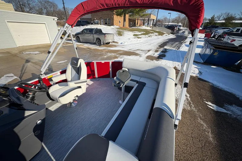 Slide: The Image of 2026 Bennington 20 SL pontoon boat with red canopy and spacious seating. - 20