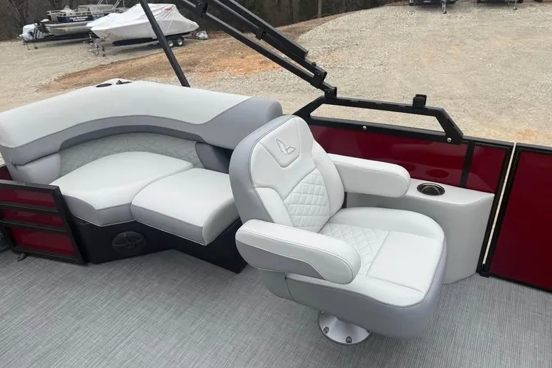 Slide: The Image of Luxurious seating on 2026 Lowe SS 230 WV pontoon boat, featuring plush upholstery and modern design. - 11