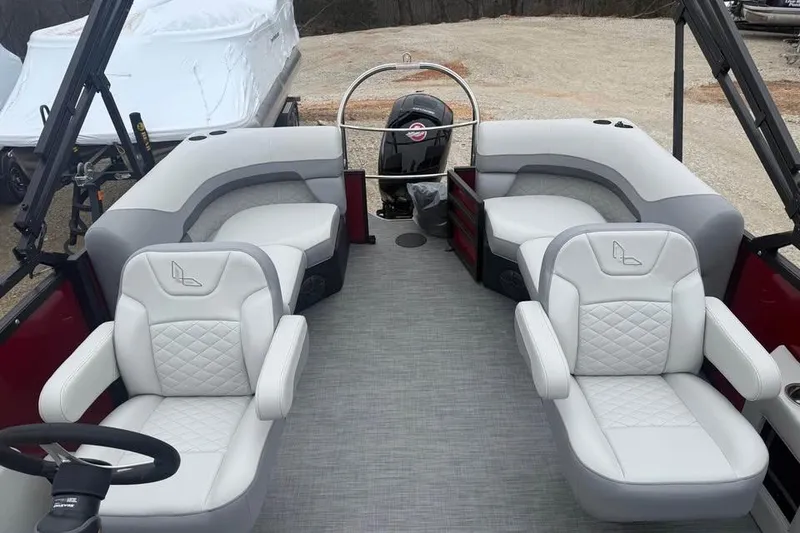 Slide: The Image of 2026 Lowe SS 230 WV boat interior with plush seating and modern design. - 14