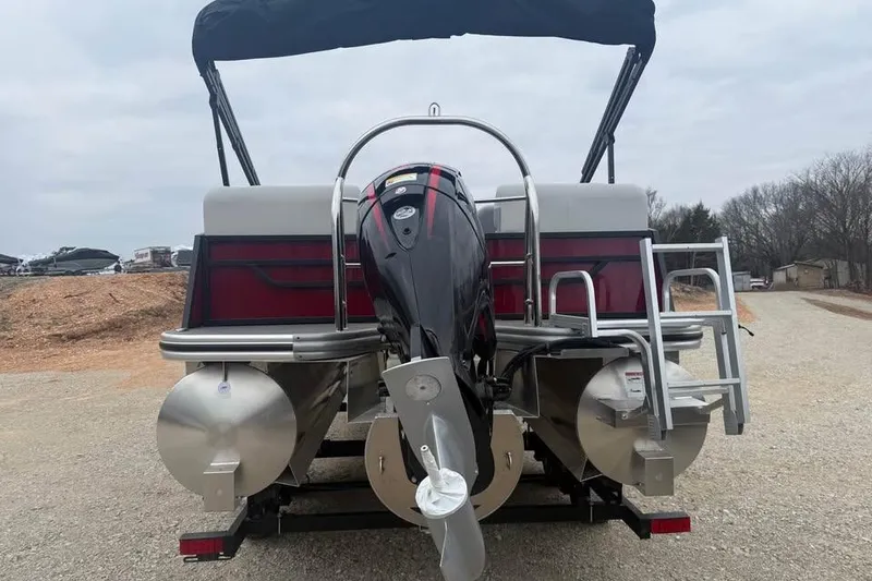 Slide: The Image of 2026 Lowe SS 230 WV pontoon boat with outboard motor, rear view. - 6