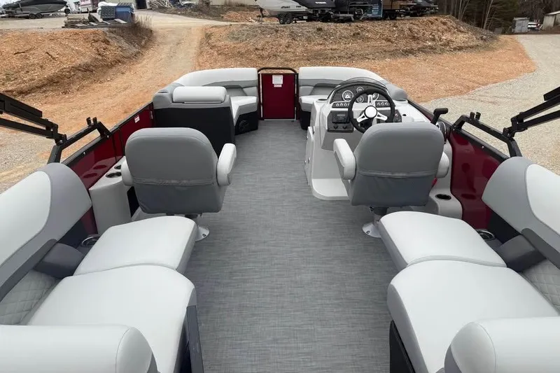 Slide: The Image of 2026 Lowe SS 230 WV pontoon boat interior with gray seating and modern dashboard. - 8