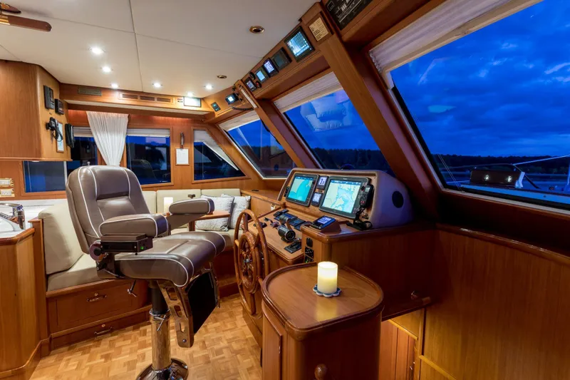 Slide: The Image of Luxurious helm of 2006 Grand Banks 59 Aleutian RP yacht with navigation equipment. - 10