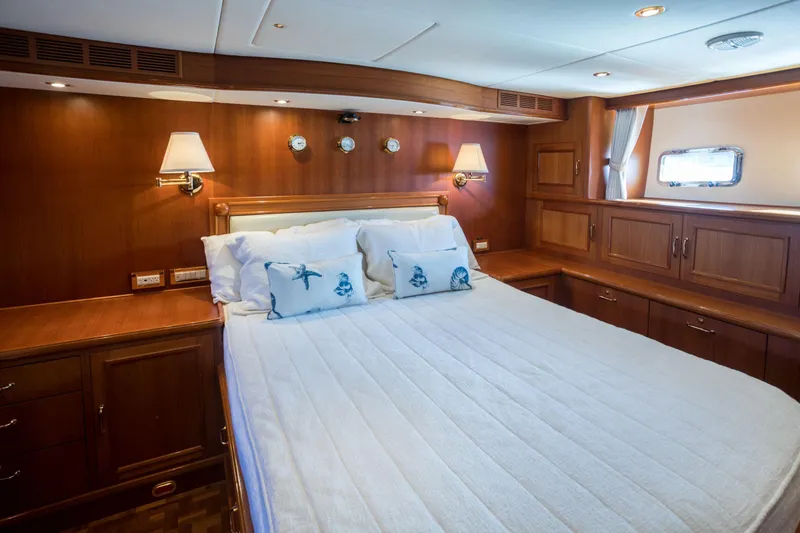 Slide: The Image of Luxurious cabin interior of 2006 Grand Banks 59 Aleutian RP yacht with elegant wood finish. - 14