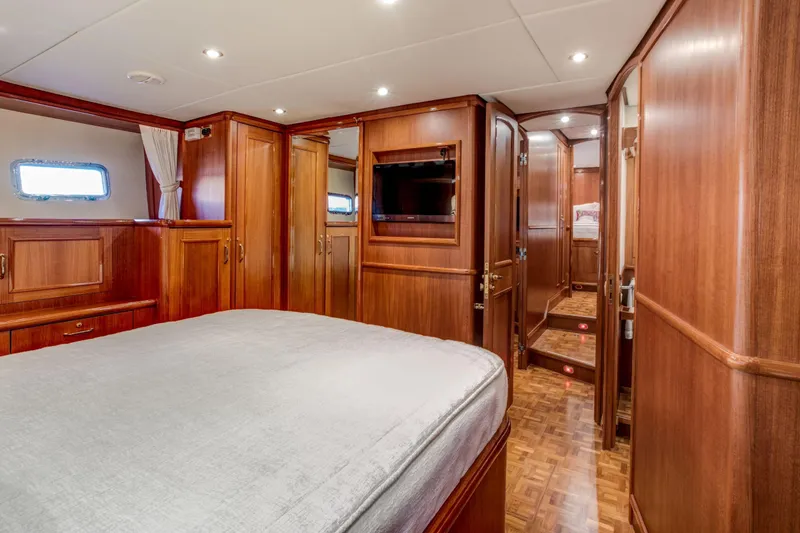 Slide: The Image of Luxurious wooden interior of 2006 Grand Banks 59 Aleutian RP yacht cabin. - 15