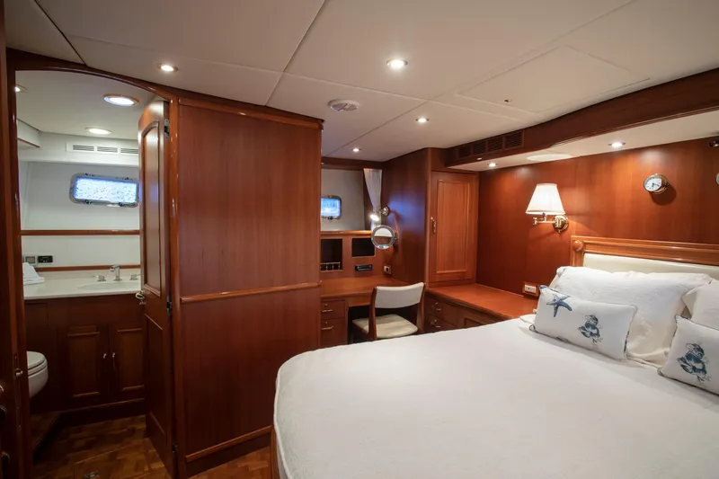 Slide: The Image of Luxurious 2006 Grand Banks 59 Aleutian RP yacht bedroom with elegant wood finish. - 16