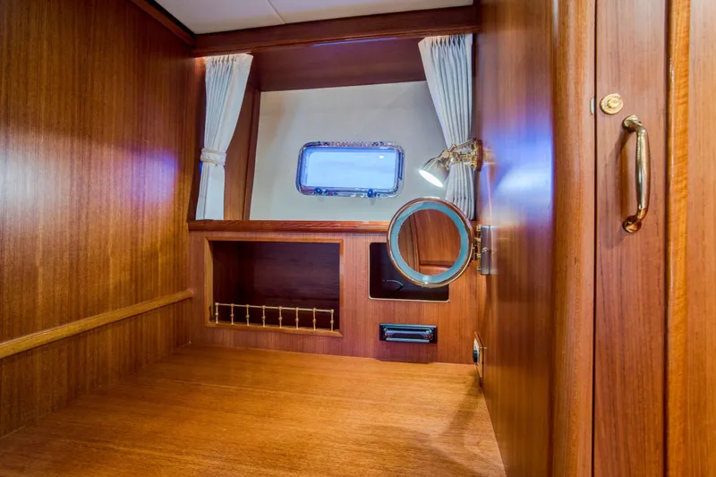 Slide: The Image of Luxurious wooden interior of 2006 Grand Banks 59 Aleutian RP yacht cabin. - 17