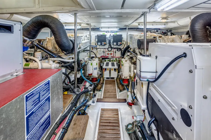 Slide: The Image of Engine room of 2006 Grand Banks 59 Aleutian RP yacht, showcasing machinery and equipment. - 40