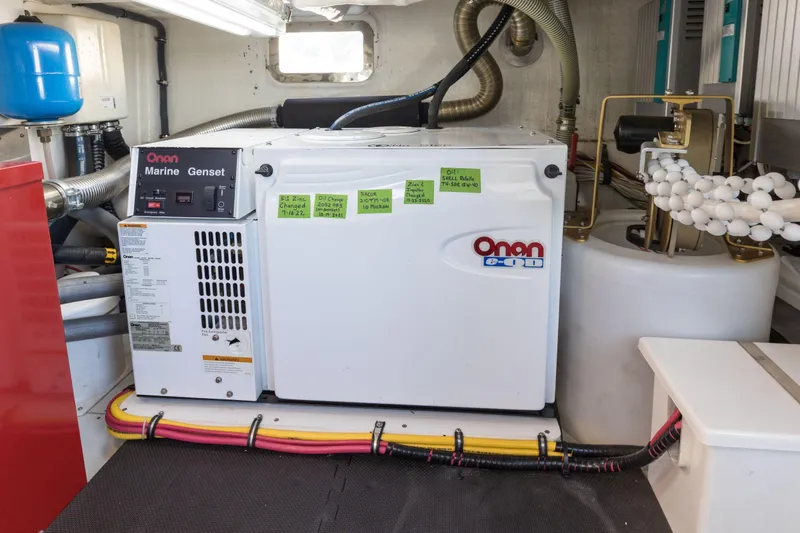 Slide: The Image of Engine room of 2006 Grand Banks 59 Aleutian RP with Onan Marine Genset. - 41