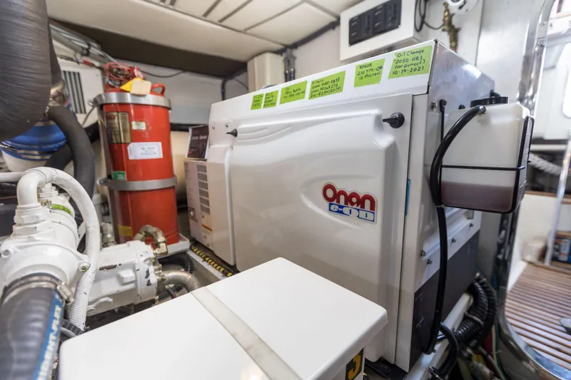 Slide: The Image of Engine room of 2006 Grand Banks 59 Aleutian RP with Onan generator and equipment. - 42