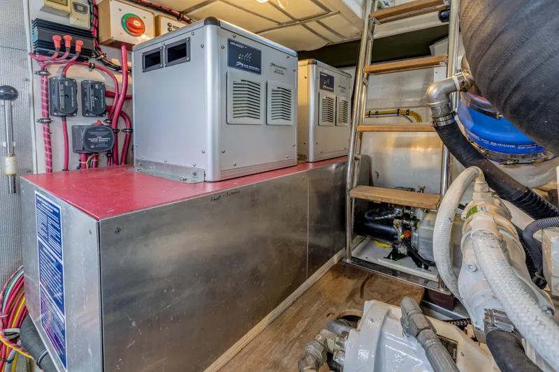 Slide: The Image of Engine room of 2006 Grand Banks 59 Aleutian RP yacht, featuring equipment and wiring. - 45
