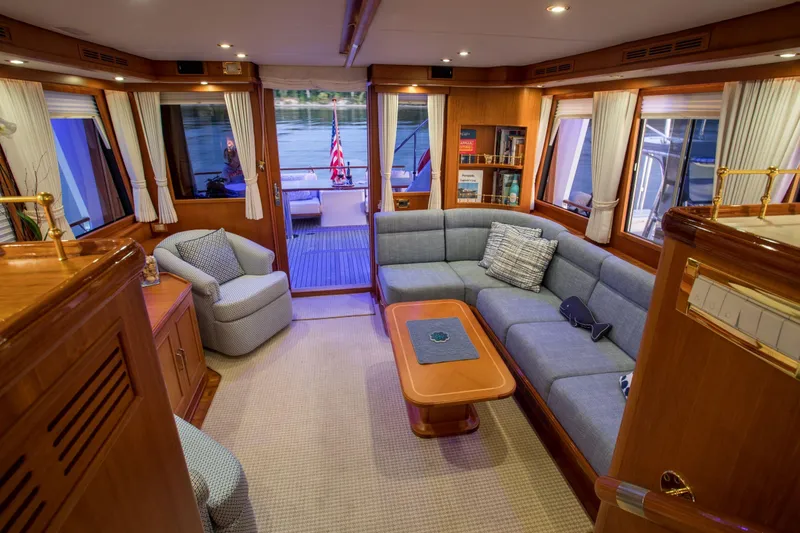 Slide: The Image of Luxurious interior of 2006 Grand Banks 59 Aleutian RP yacht with elegant seating and decor. - 6