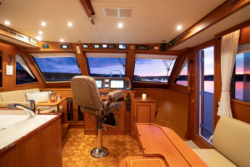 Slide: The Image of Luxurious 2006 Grand Banks 59 Aleutian RP yacht interior with sunset view. - 9