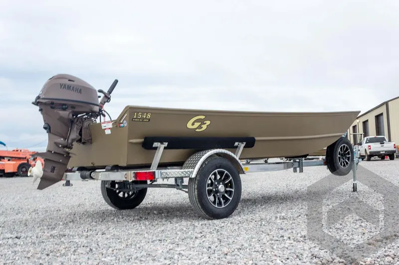 Slide: The Image of 2026 G3 Gator Tough 1548 VBW boat on trailer with Yamaha outboard motor. - 11