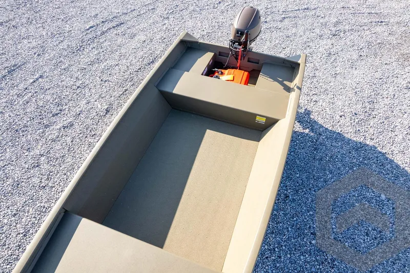 Slide: The Image of 2026 G3 Gator Tough 1548 VBW boat on gravel surface, showcasing interior and motor. - 35