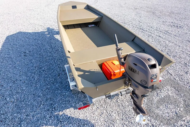 Slide: The Image of 2026 G3 Gator Tough 1548 VBW boat with Yamaha 25 outboard motor on gravel. - 36