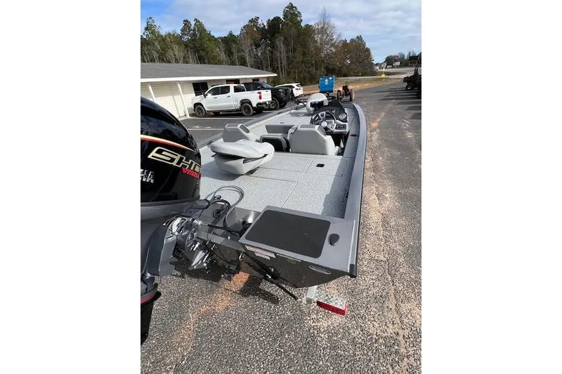 Slide: The Image of 2026 G3 Sportsman 1710 SE boat parked outdoors, showcasing sleek design and modern features. - 5