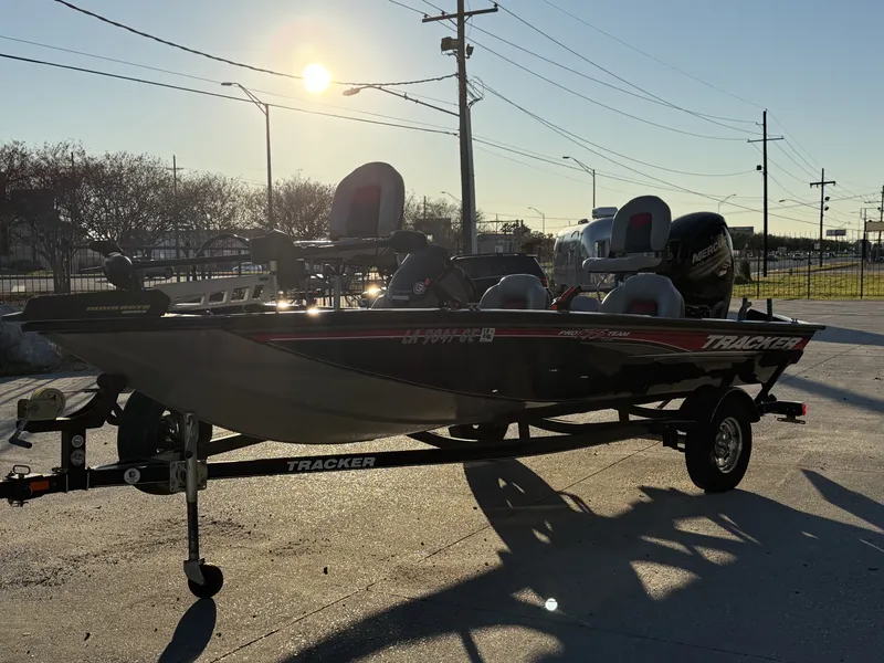 Slide: The Image of 2016 Tracker Pro Team 175 TXW boat at sunset. - 14