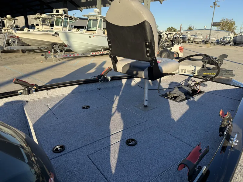 Slide: The Image of 2016 Tracker Pro Team 175 TXW boat with seat and fishing rod holders. - 19