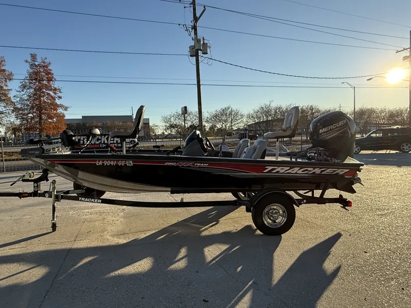 Slide: The Image of 2016 Tracker Pro Team 175 TXW boat at sunset. - 3