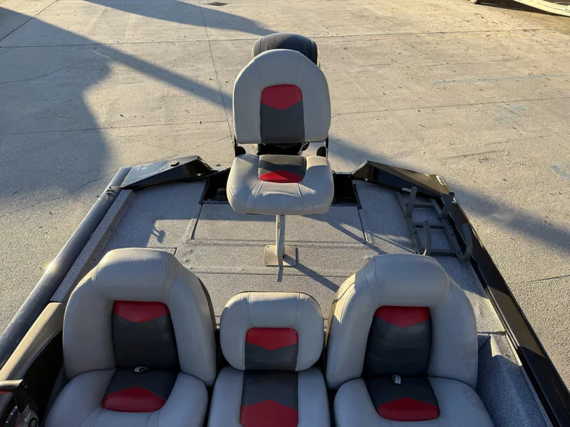 Slide: The Image of 2016 Tracker Pro Team 175 TXW boat seats, gray and red design. - 8