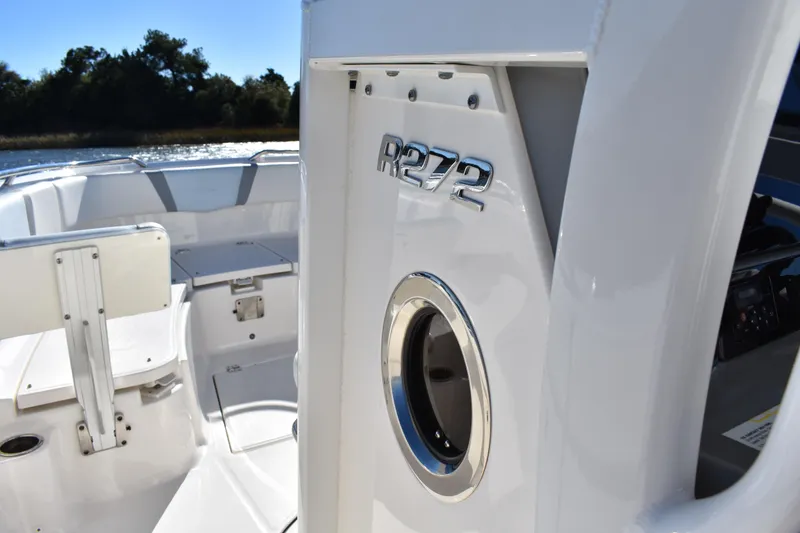 Slide: The Image of 2022 Robalo R272 Center Console boat interior with sleek design and modern features. - 37