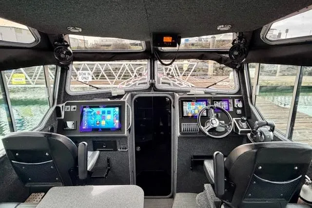 Slide: The Image of Interior of a 2017 Life Proof 33 boat with modern navigation equipment. - 15