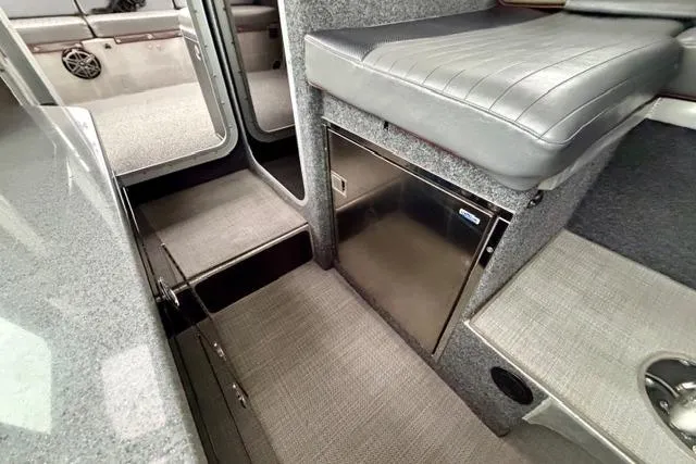 Slide: The Image of Interior of 2017 Life Proof 33 boat with seating and storage compartments. - 22