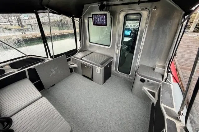 Slide: The Image of Interior of 2017 Life Proof 33 boat with seating and navigation equipment. - 30
