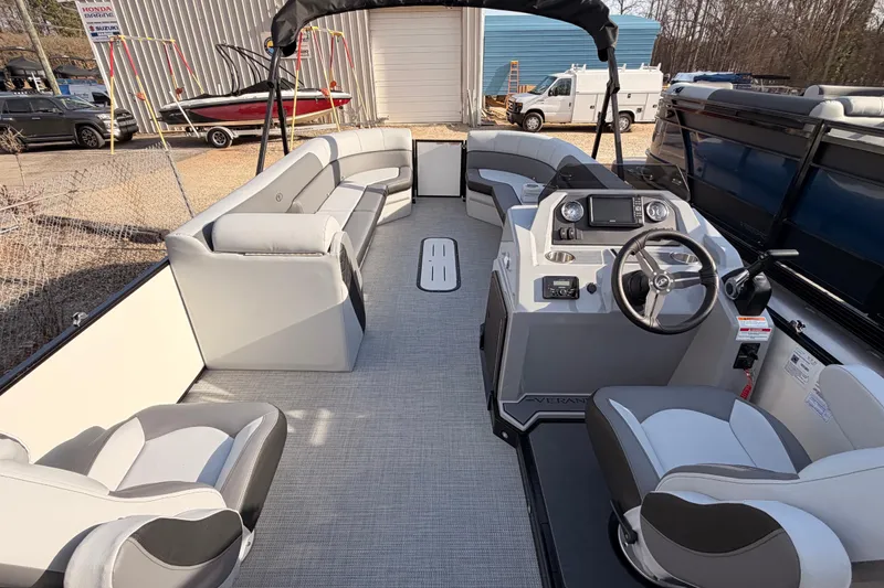Slide: The Image of 2026 Veranda Vista Sport VS 25 RC pontoon boat interior with modern seating and helm. - 15