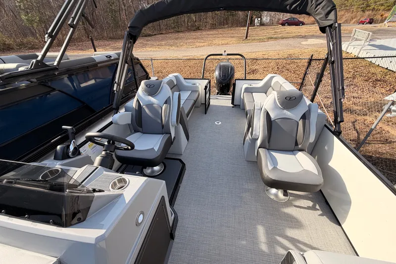 Slide: The Image of 2026 Veranda Vista Sport VS 25 RC boat interior with modern seating and steering console. - 6