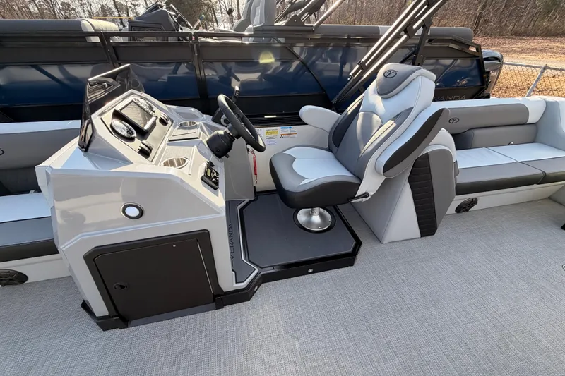 Slide: The Image of 2026 Veranda Vista Sport VS 25 RC boat interior with modern helm and seating. - 7
