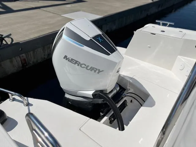 Slide: The Image of 2023 Nimbus W9 boat with Mercury outboard engine at dockside. - 6