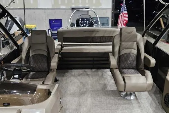 Slide: The Image of 2026 Bennington 24 L Swingback interior with luxurious seating and modern design. - 12