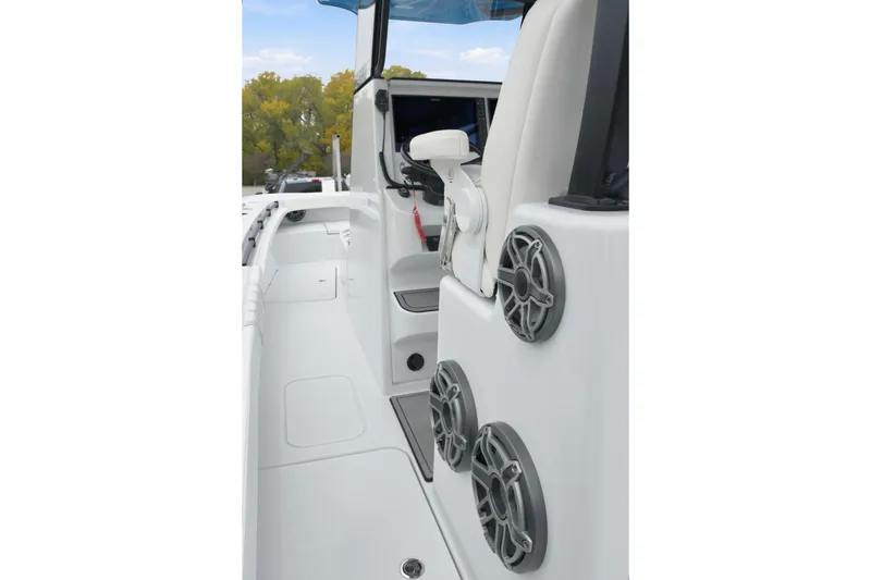 Slide: The Image of 2023 Costa Custom Boats 264 HC interior with speakers and seating. - 13